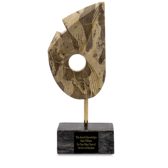 Modern recognition or retirement gift: 16-inch beige marble Summit of Distinction award with gold rod and black marble base.
