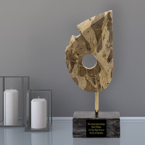 Marble Summit of Distinction award with gold rod and black marble base.