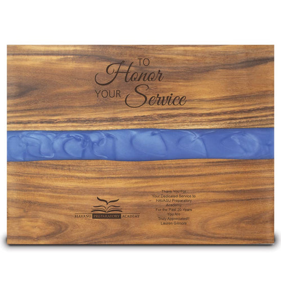 acacia wood serving board with blue epoxy resin featuring lasered pre-designed educational message with custom logo