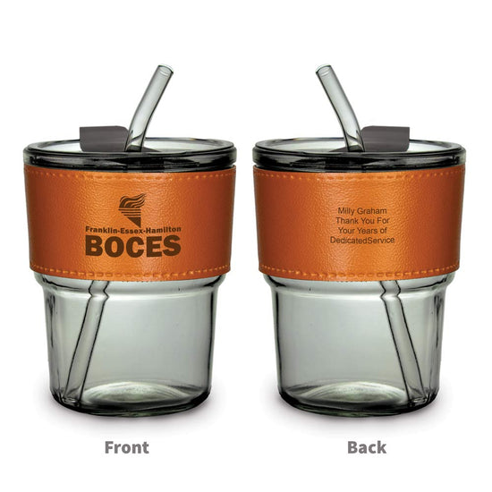 two glass tumblers with leather sleeves