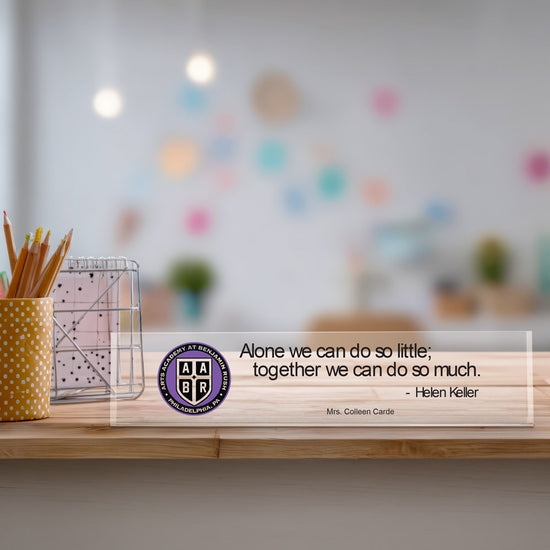 clear acrylic desk sign with the inspirational message: Alone we can do so little; together we can do so much and personalization