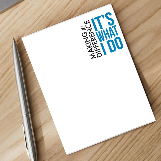 making a difference it's what i do notepad and silver pen sitting on a desk