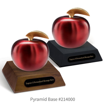 black and a brown walnut pyramid bases with black brass plates and crimson finished brass apples