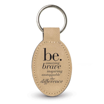 light brown oval leather keychain with be collection message