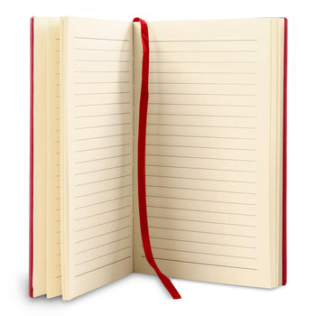 opened red journal with lined paper and satin ribbon bookmark
