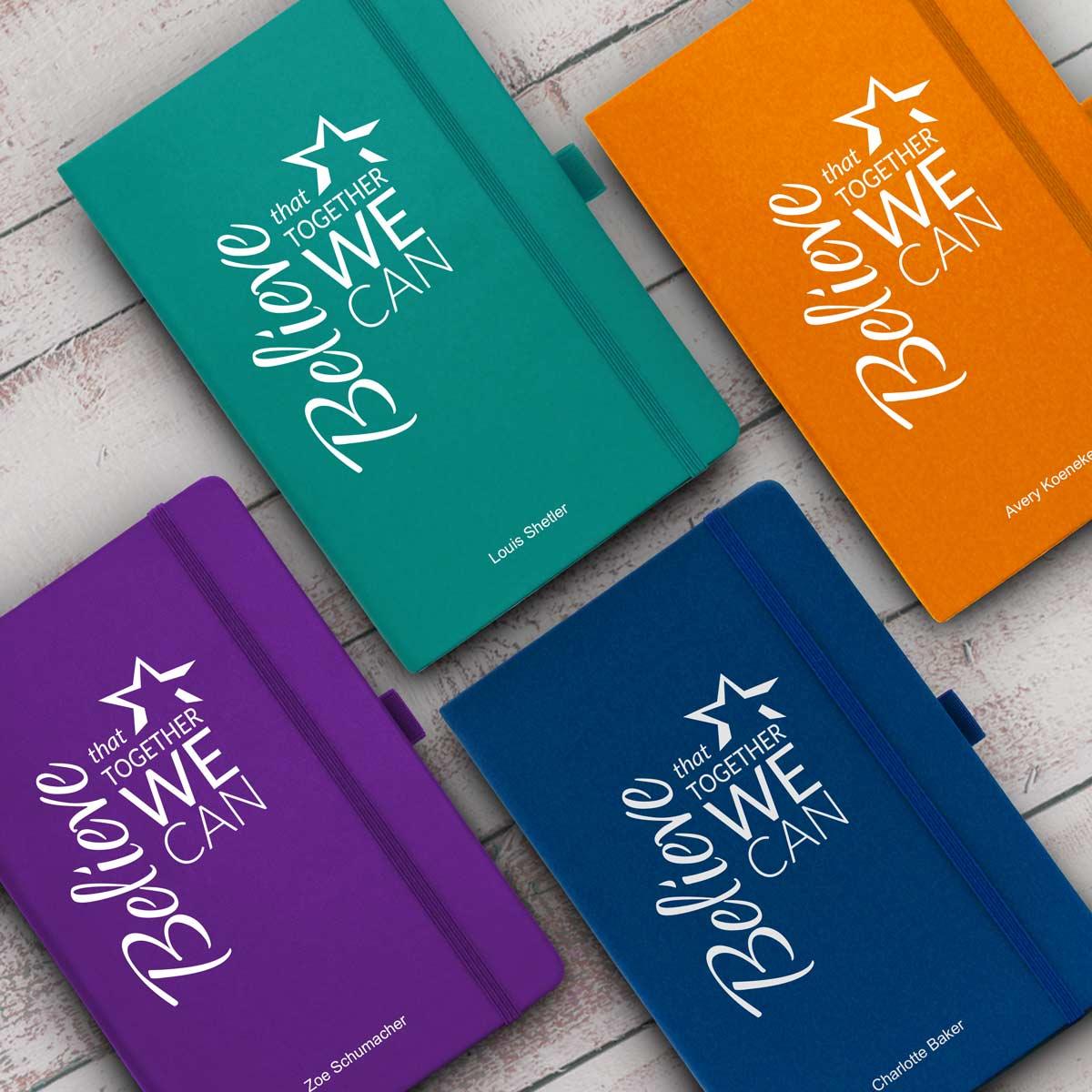 multiple colors of believe journals with personalization