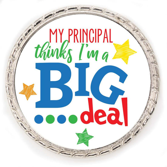 Kudo Coin With “My Principal (Teacher) thinks I’m A Big Deal”. Made Of Silver Metal Featuring Rope Design Around The Outside.