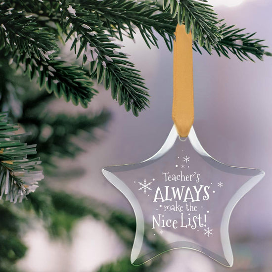 star shaped crystal ornament with teacher's always on nice list message and gold satin ribbon