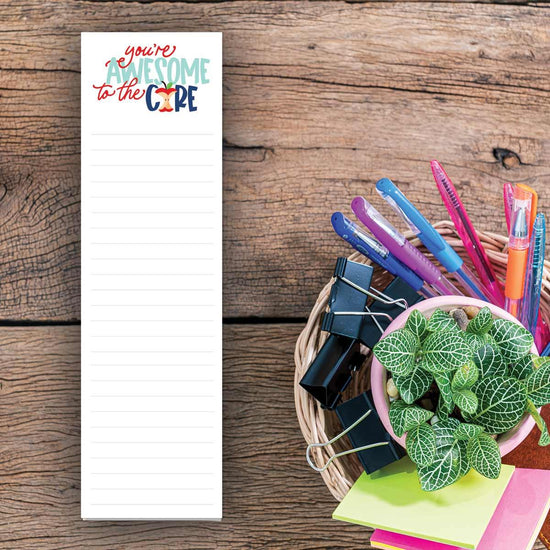 you're awesome to the core notepad sitting on a desk