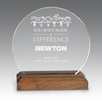 Round acrylic award with walnut base, featuring educational recognition messaging and customizable logo and personalization. 