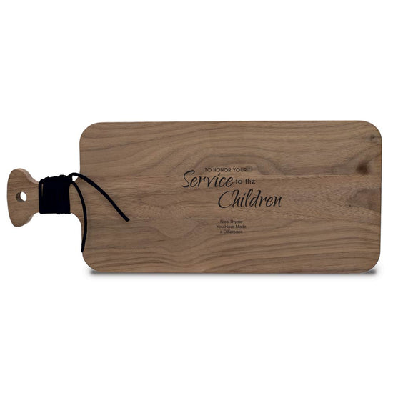 17.5x7x.75 solid walnut charcuterie cutting board with handle and leather wrap. Add custom laser-engraved logo. 