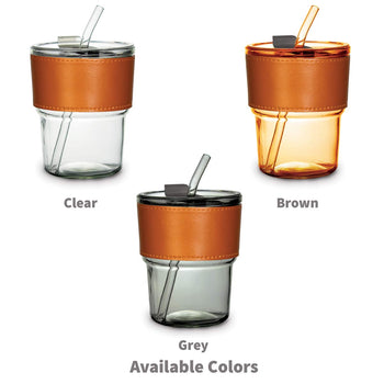 three glass tumblers with leather sleeves