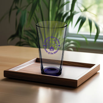 clear 16-ounce pint glass with purple bottom and logo