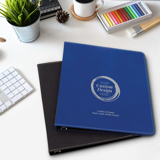create your own rawhide and gray leather notebooks sitting on a desk