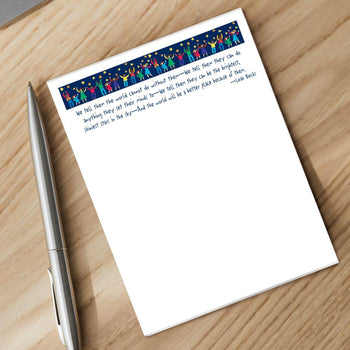 star polisher notepad and silver pen sitting on a desk