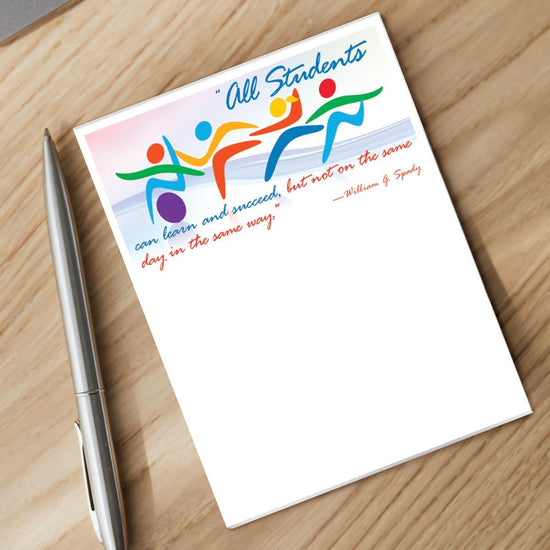 all student can learn notepad and silver pen sitting on a desk
