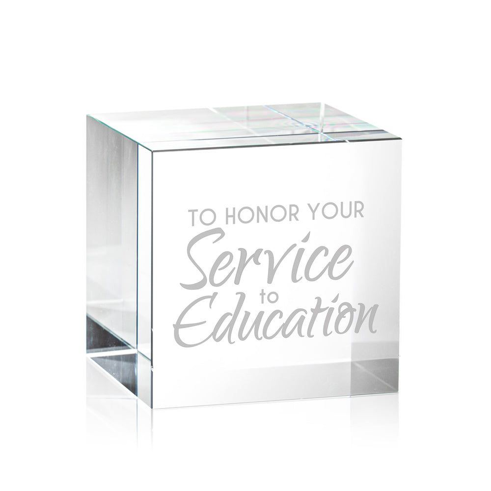 optic crystal cube featuring service to education message