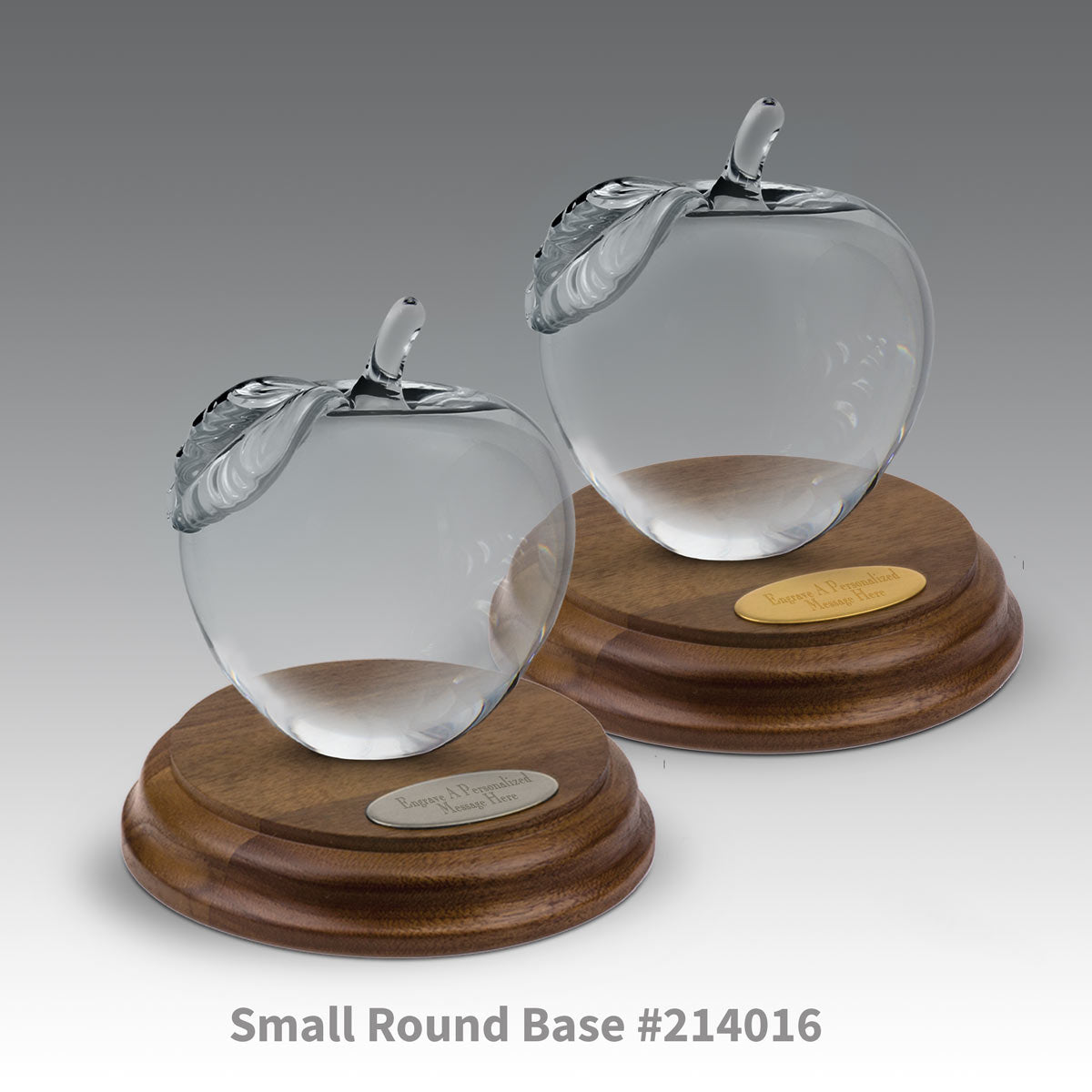 round walnut bases with brass and silver plates and crystal apples