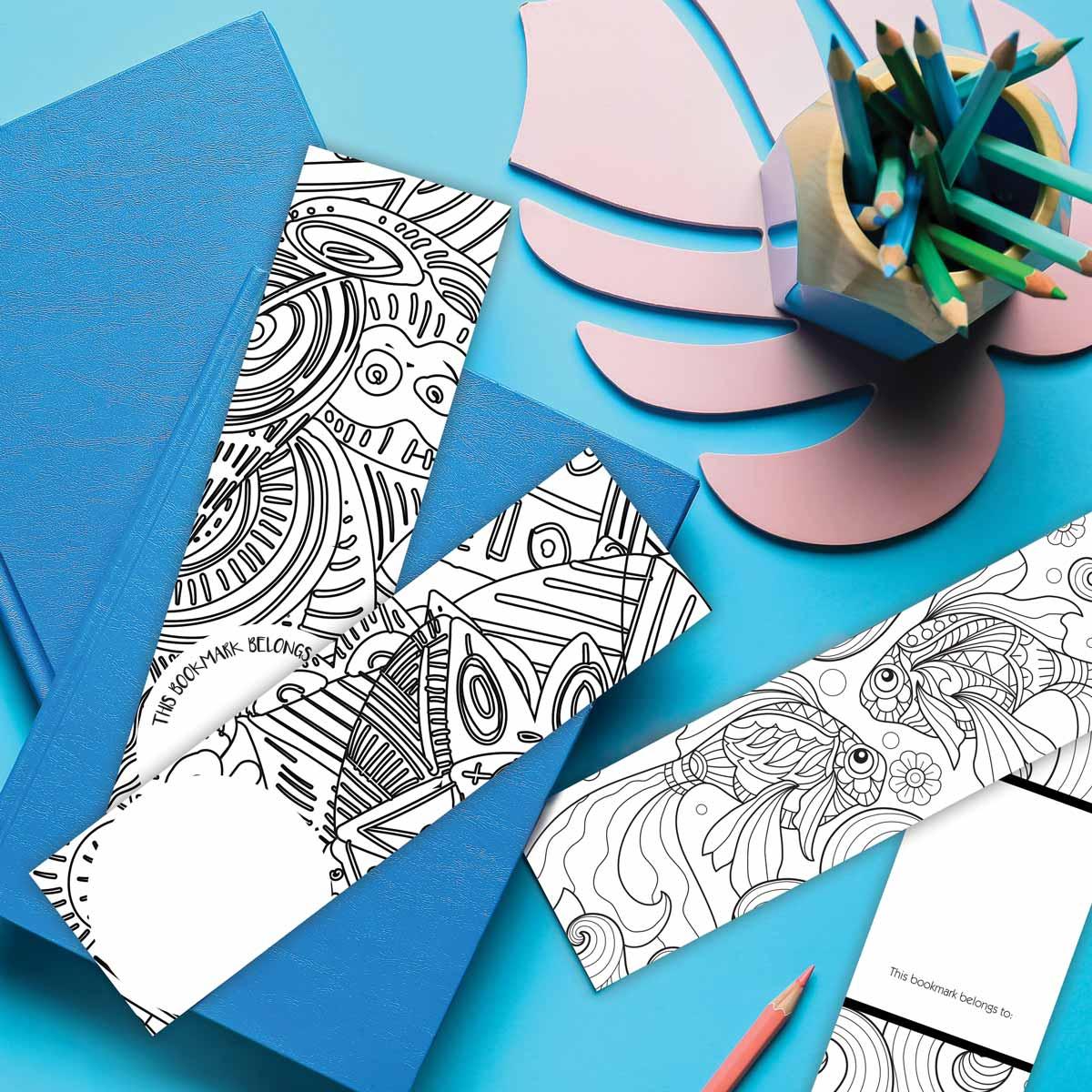 geometric coloring bookmark laying on a desk