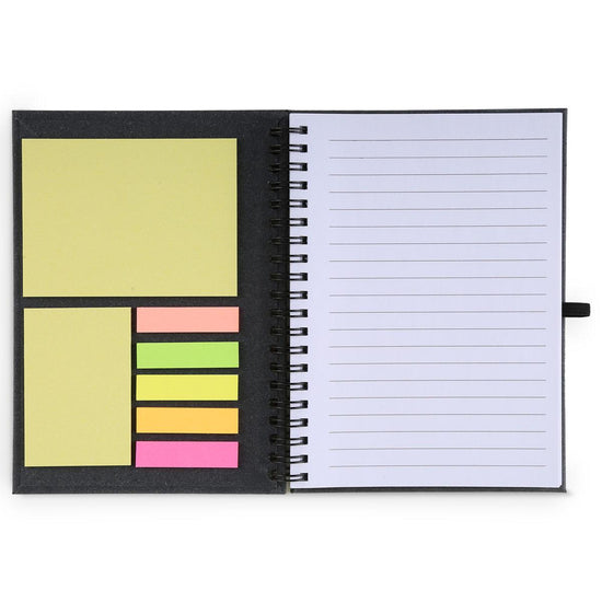 opened notebook with sticky notes and lined paper