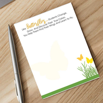 helping students find their wings notepad with a pen sitting on a desk