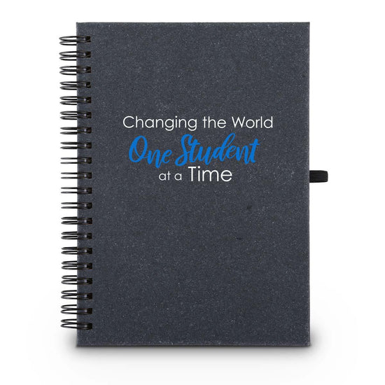 Hardbound spiral journal. Sticky notes, flags inside. Cover reads: One Student At A Time