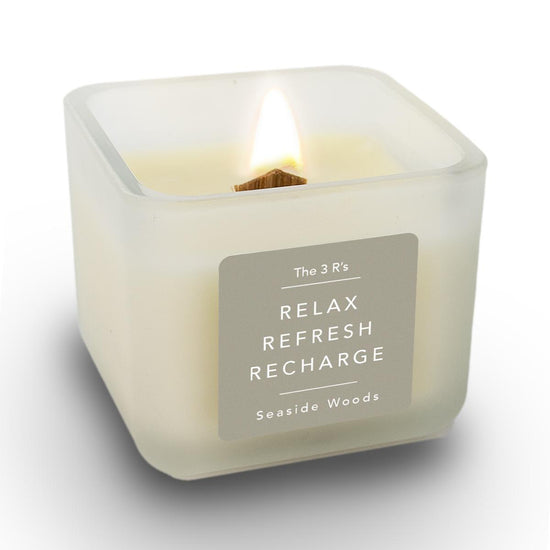 16 oz. Soy Wax Candle With Wooden Wick featuring The 3R’s Relax, Refresh, Recharge message. Refreshing Seaside Woods scent.  