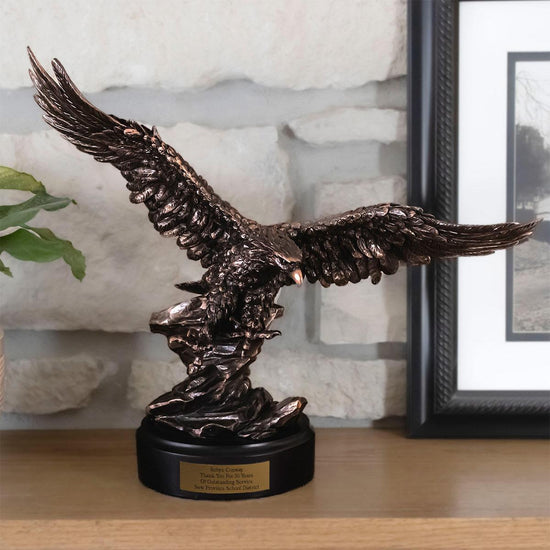 soaring eagle sitting on shelf