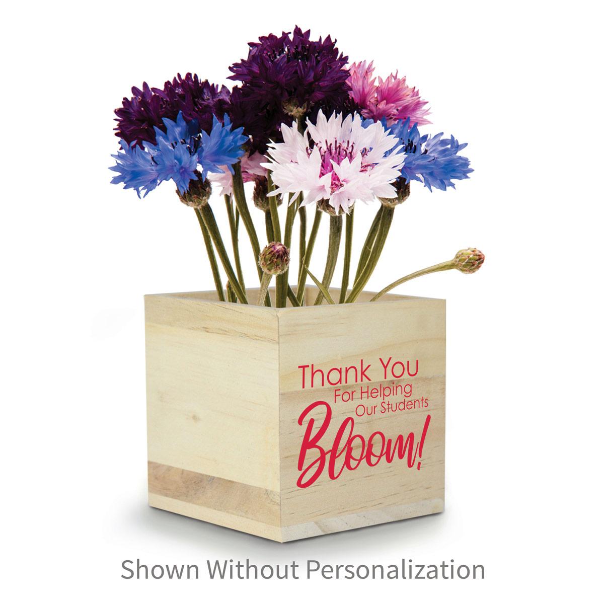 colorful flowers in a wooden cube with thank you message