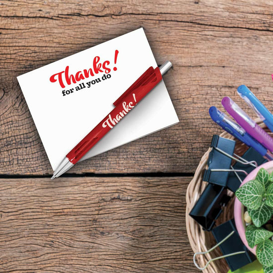 thanks for all you do notepad and pen sitting on a desk