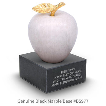 black marble base with white marble apple