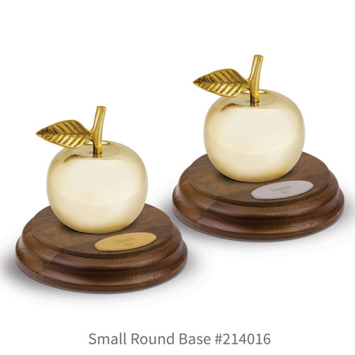 round walnut bases with brass and silver plates and brass apple bells