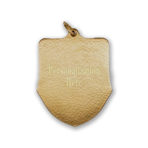 back side of brass shield medal with engraving