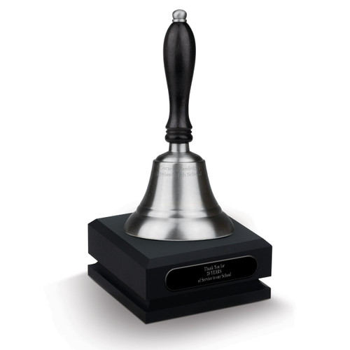 personalized pewter bell sitting on top a black walnut base with black brass plate