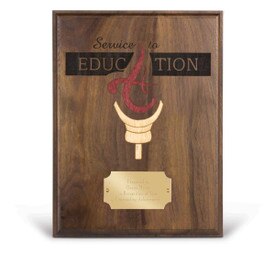 laser engraved solid walnut plaque with a torch and service to education message