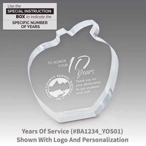 acrylic apple award with 10 years of service laser-engraved message