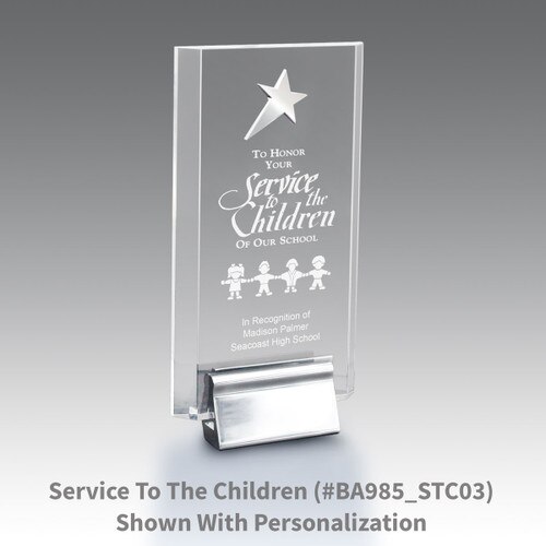 acrylic tower award featuring a silver metal star and service to children message
