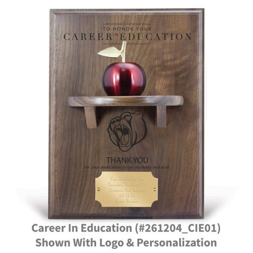 career in education message on a walnut plaque with a shelf, red apple bell and personalized brass plate