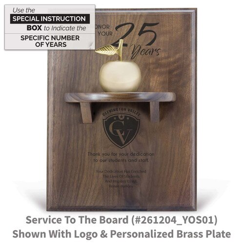 years of service message on a walnut plaque with a shelf, brass apple bell and personalized brass plate