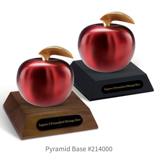 black and a brown walnut pyramid bases with black brass plates and crimson finished brass apples