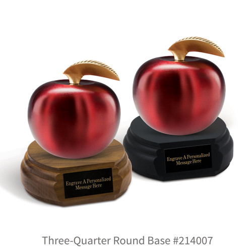 black and a brown walnut three-quarter round bases with black brass plates and crimson finished brass apples
