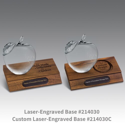 laser engraved walnut bases with black brass plates and crystal apples