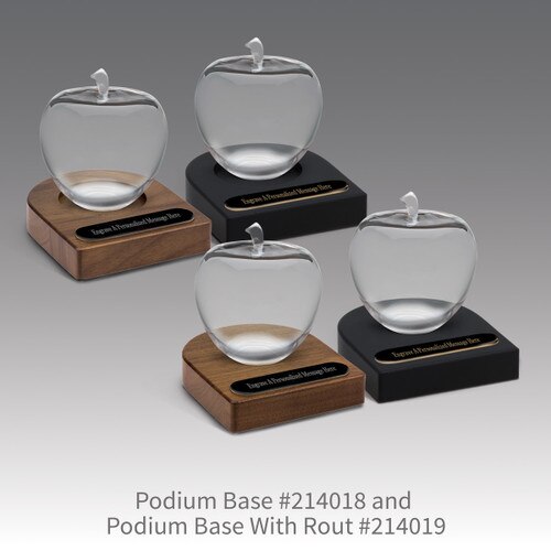 black and brown walnut podium bases with black brass plates and optic crystal apples