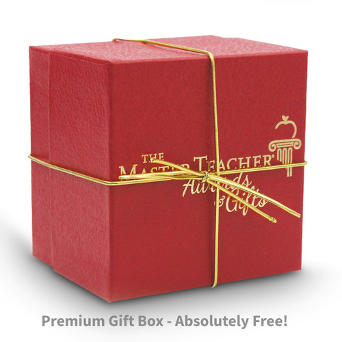 red gift box with gold elastic bow and The Master Teacher logo