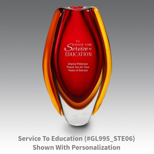 red glass vase with service to education message