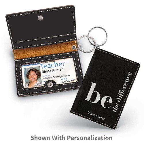 black leather id holder with be the difference message