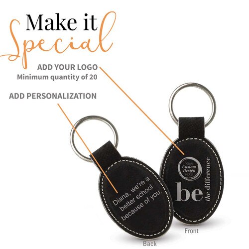 black oval leather keychain with be the difference message and add you logo