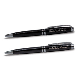2 black metal ballpoint pens with messages