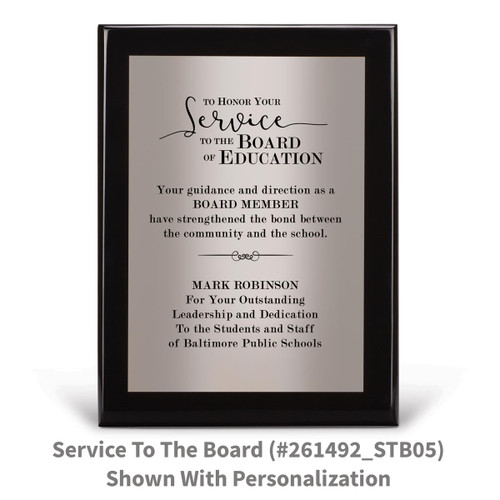 black piano finish plaque with service to the board message and a personalized silver plate
