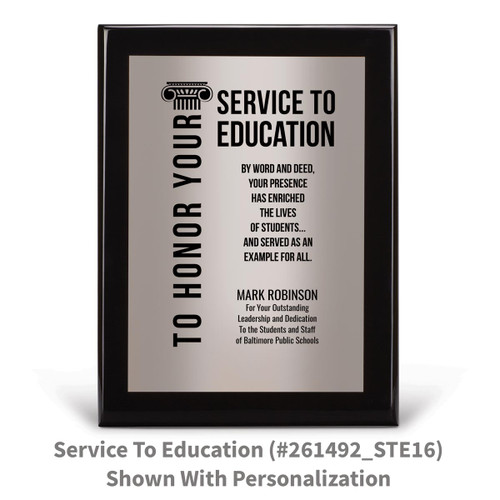 black piano finish plaque with service to education message and a personalized silver plate